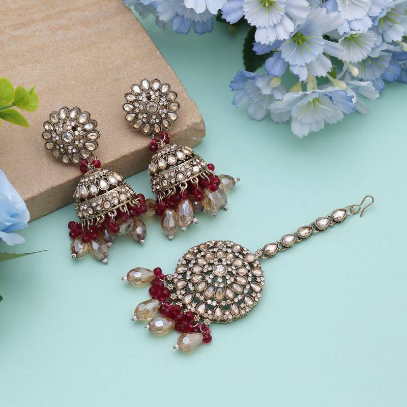 Rani color kundan earrings tikka set