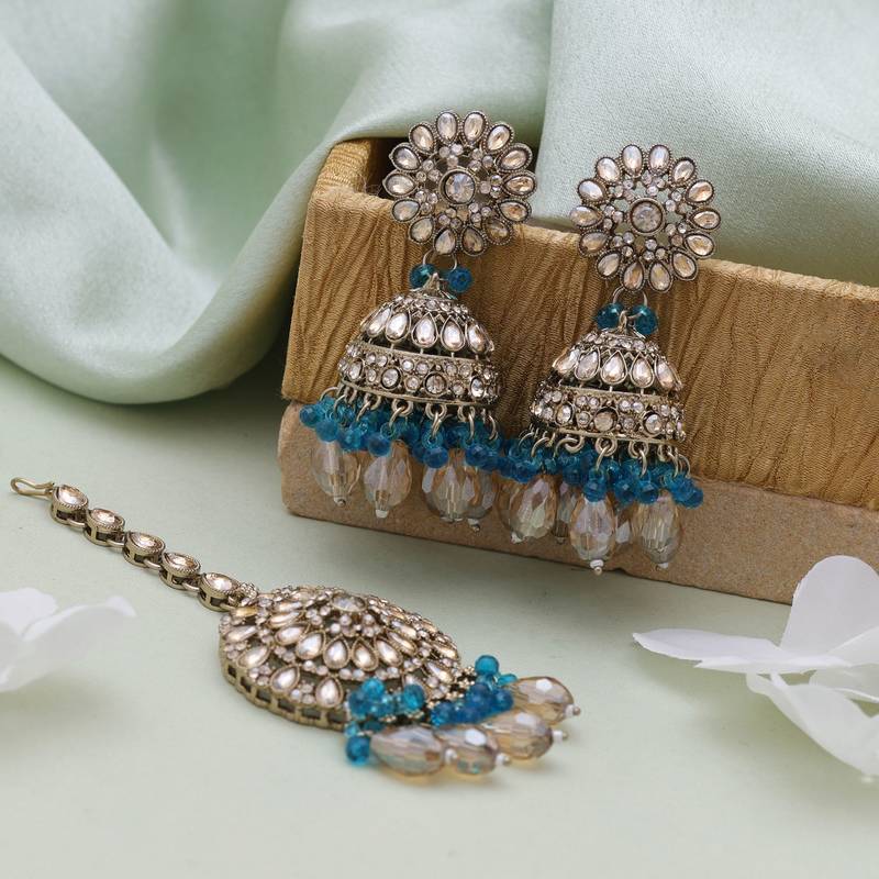 Rama green color kundan earrings tikka set