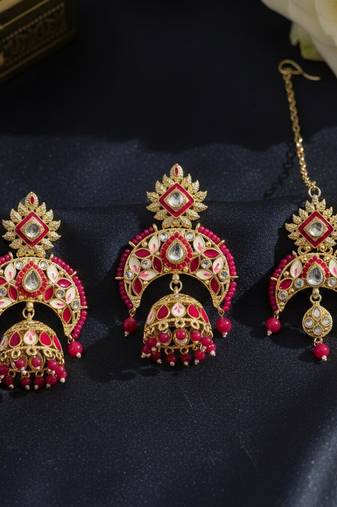 Rani color meena work kundan earrings tikka set