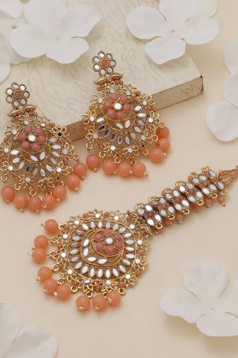 Peach color kundan earrings tikka set