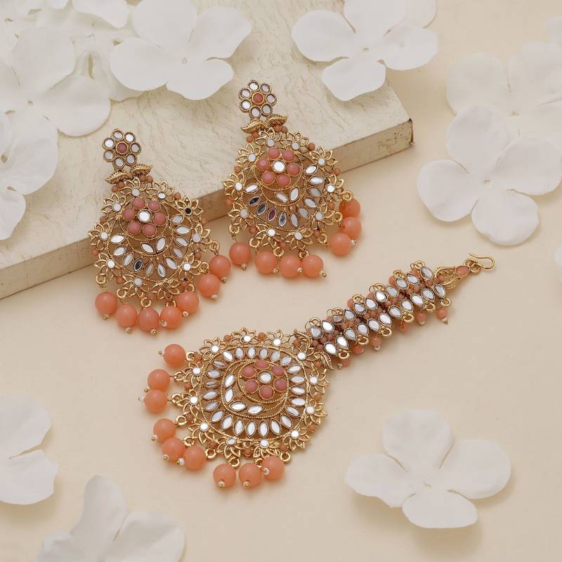 Peach color kundan earrings tikka set