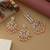 Peach color kundan earrings tikka set
