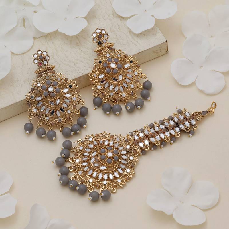 Grey color kundan earrings tikka set