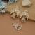 White color kundan earrings tikka set
