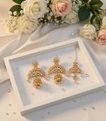 Peach color kundan earrings tikka set