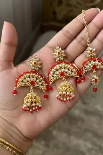 Magenta color kundan earrings tikka set