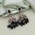 Black color kundan earrings