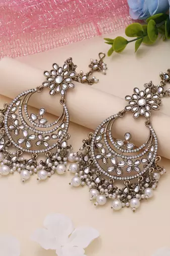 White color kundan earrings