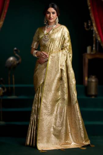 Light green premium satin silk saree with stylish pom-pom pallu