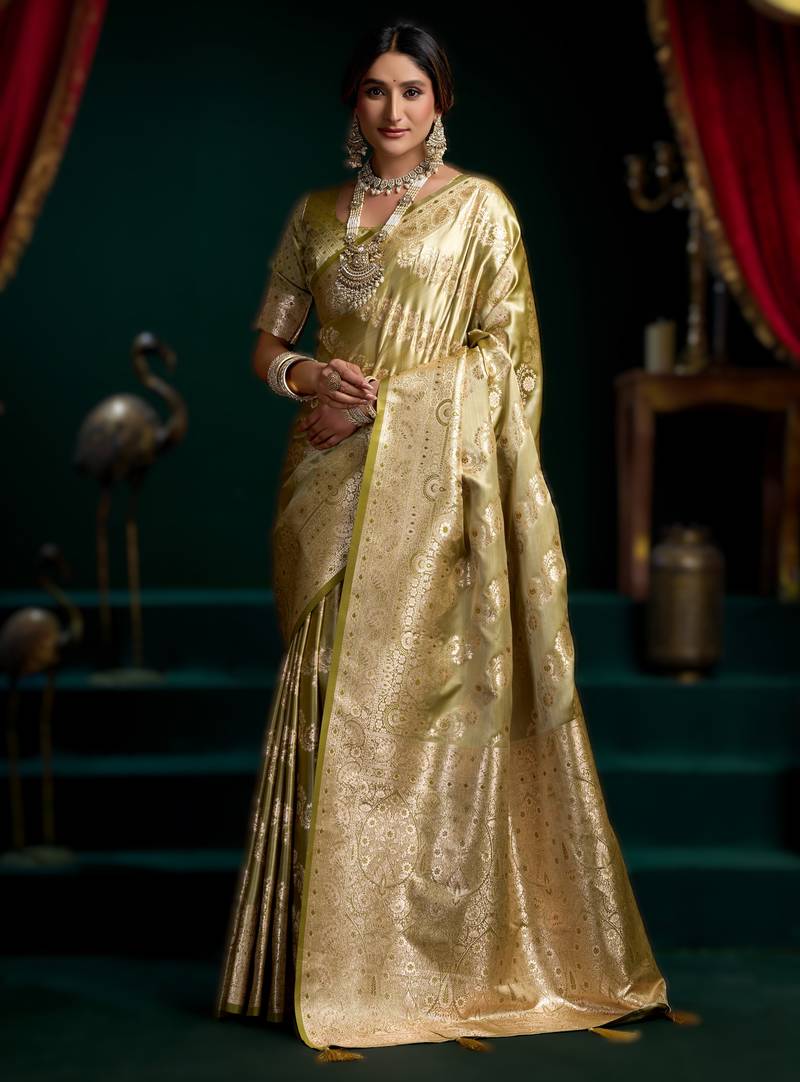 Light green premium satin silk saree with stylish pom-pom pallu