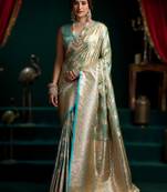 Sky blue premium satin silk saree with stylish pom-pom pallu