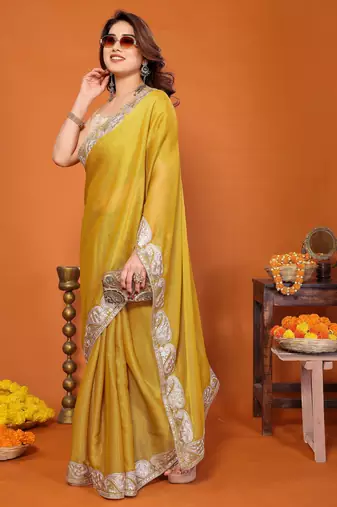 yellow mannequin embroidery  work  saree 