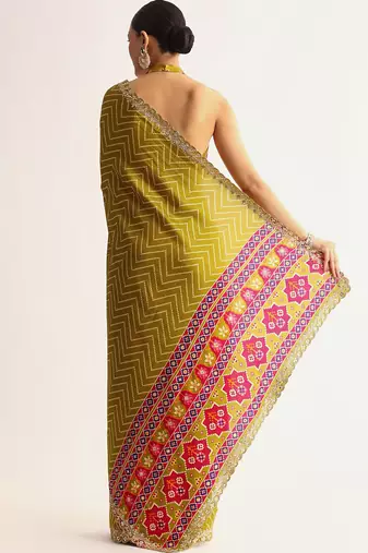 yellow manipuri silk saree with embroidered lace and print