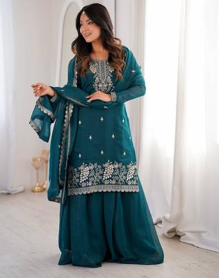 Traditional teal embroidered kurta with flowy palazzo 1