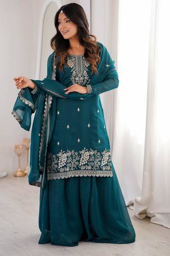 Traditional teal embroidered kurta with flowy palazzo