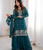 Traditional teal embroidered kurta with flowy palazzo