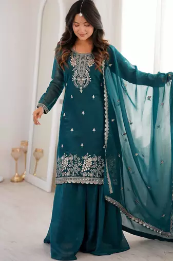 Traditional teal embroidered kurta with flowy palazzo