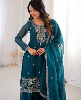 Traditional teal embroidered kurta with flowy palazzo 3
