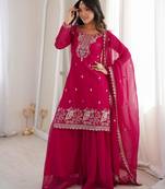 Traditional dark pink embroidered kurta with flowy palazzo