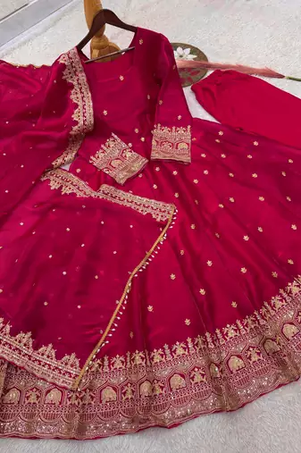 Rani-pink anarkali suit with embroidered sequins work