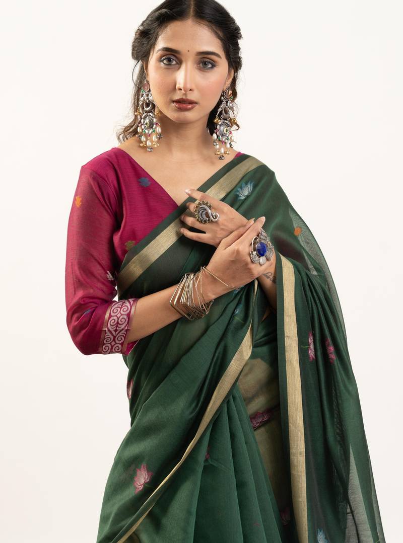 green solid blended cotton saree with blouse