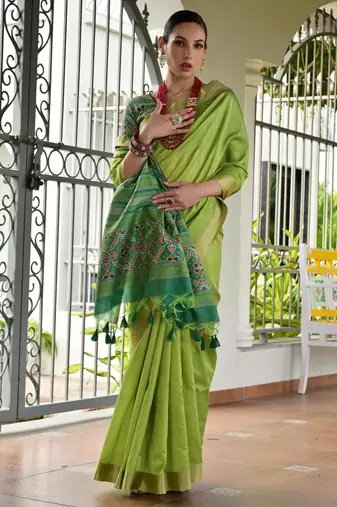 green solid raw silk blend saree with blouse