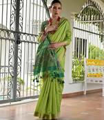 green solid raw silk blend saree with blouse