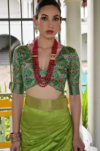 green solid raw silk blend saree with blouse