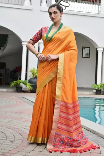 orange solid raw silk blend saree with blouse