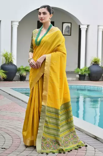 yellow solid raw silk blend saree with blouse