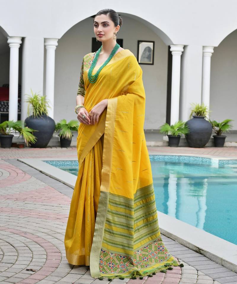yellow solid raw silk blend saree with blouse