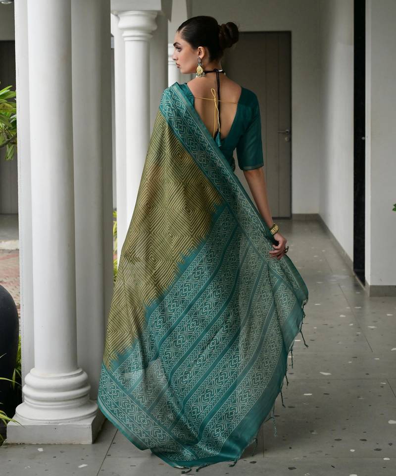green solid tussar silk saree with blouse