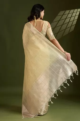 yellow solid tissue saree with blouse