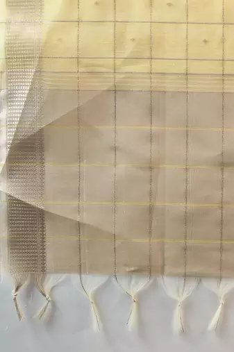 yellow solid tissue saree with blouse
