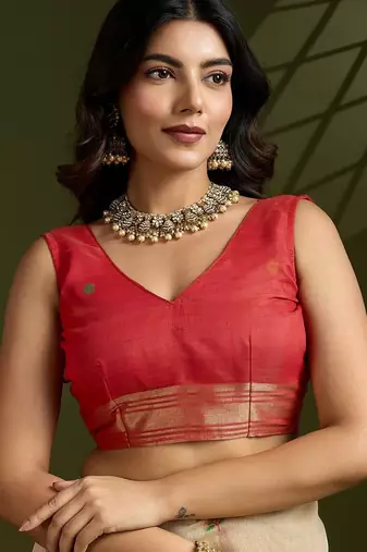 beige solid blended cotton saree with blouse