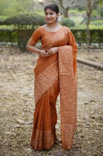 orange solid raw silk blend saree with blouse