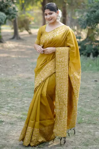 yellow solid raw silk blend saree with blouse