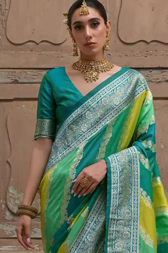 Green solid silk blend saree with blouse