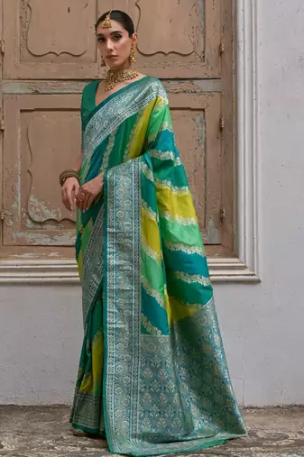 Green solid silk blend saree with blouse
