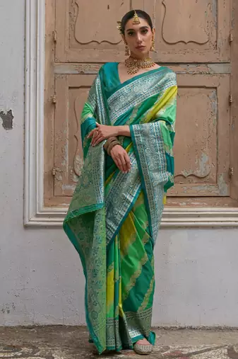Green solid silk blend saree with blouse