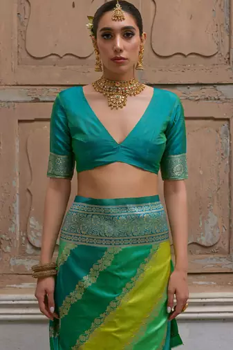 Green solid silk blend saree with blouse