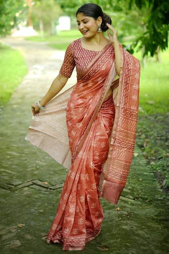 orange solid silk blend saree with blouse