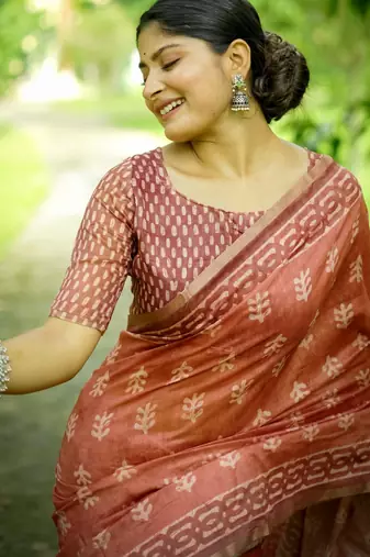 orange solid silk blend saree with blouse