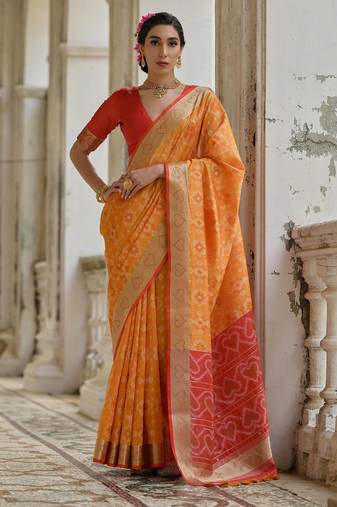 Orange solid raw silk blend saree with blouse