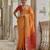 Orange solid raw silk blend saree with blouse