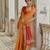 Orange solid raw silk blend saree with blouse