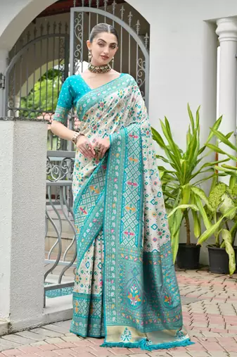 Green solid silk blend saree with blouse