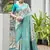 Green solid silk blend saree with blouse