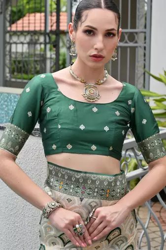 Green solid silk blend saree with blouse