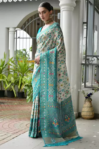 Green solid silk blend saree with blouse